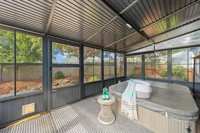 a living room with large windows