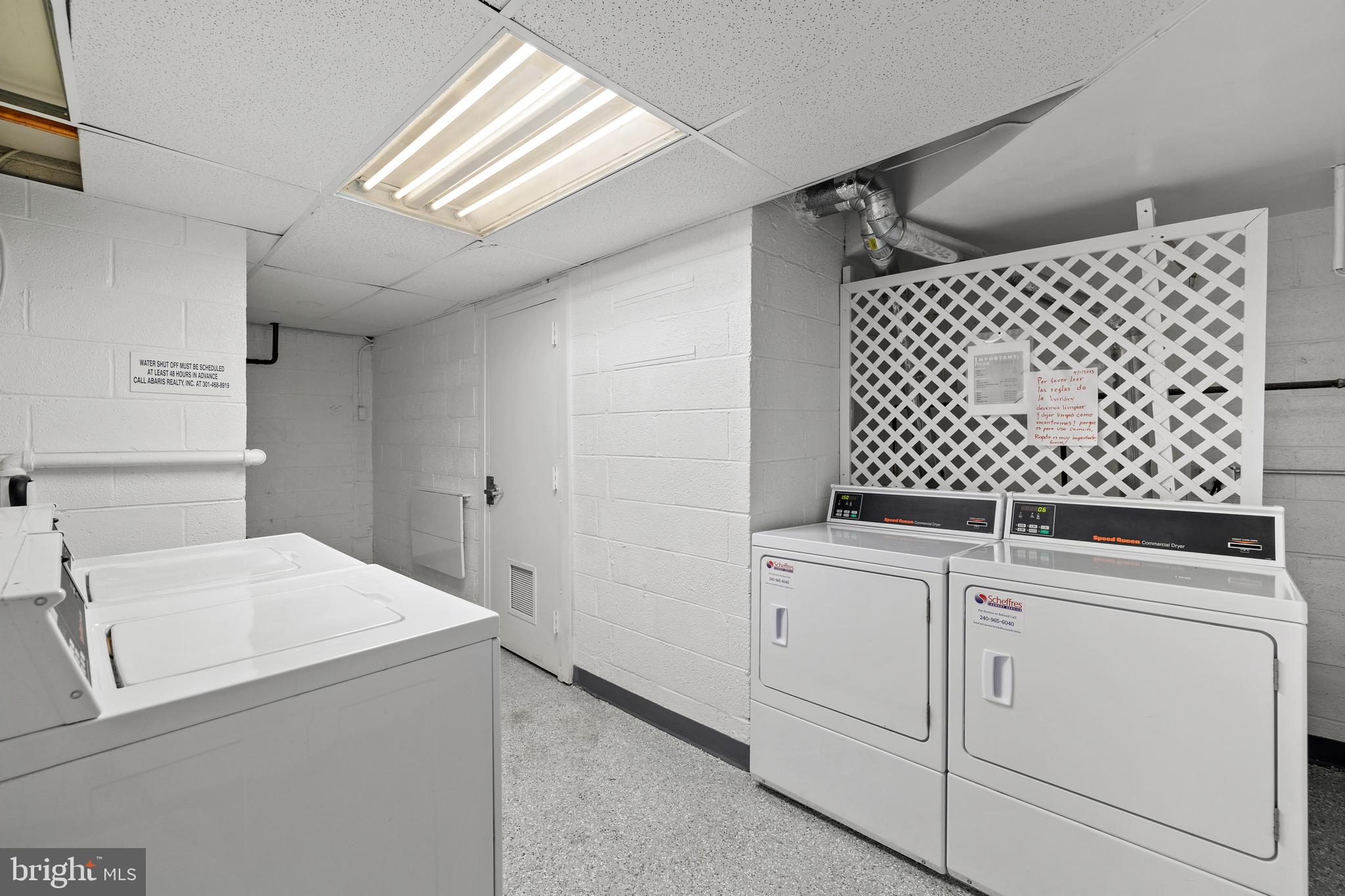 11607 Elkin Street, Unit 102 Silver Spring, MD 20902 - Photo 21 of 23 laundry room lower level of the building.