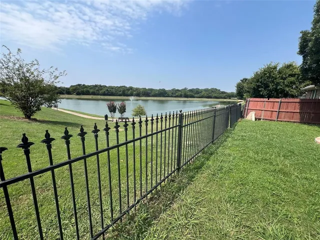 a view of a balcony with lake view