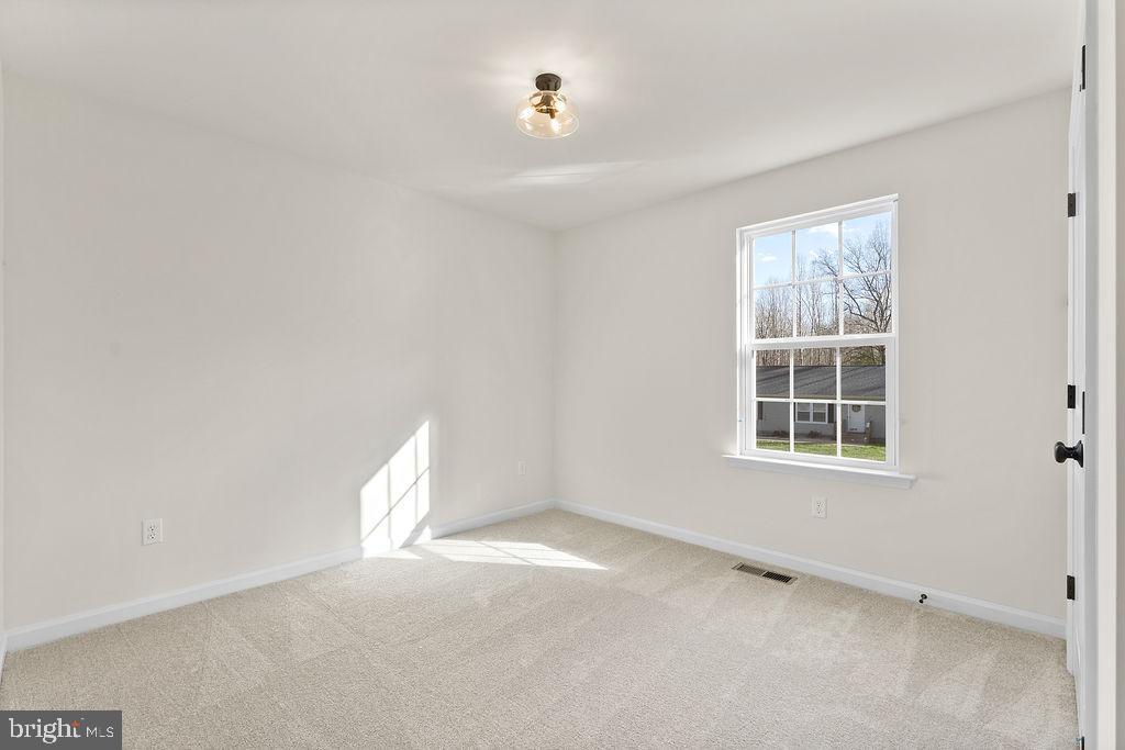 512 Cedar Hill Road Mineral, VA 23117 - Photo 20 of 53 an empty room with a window