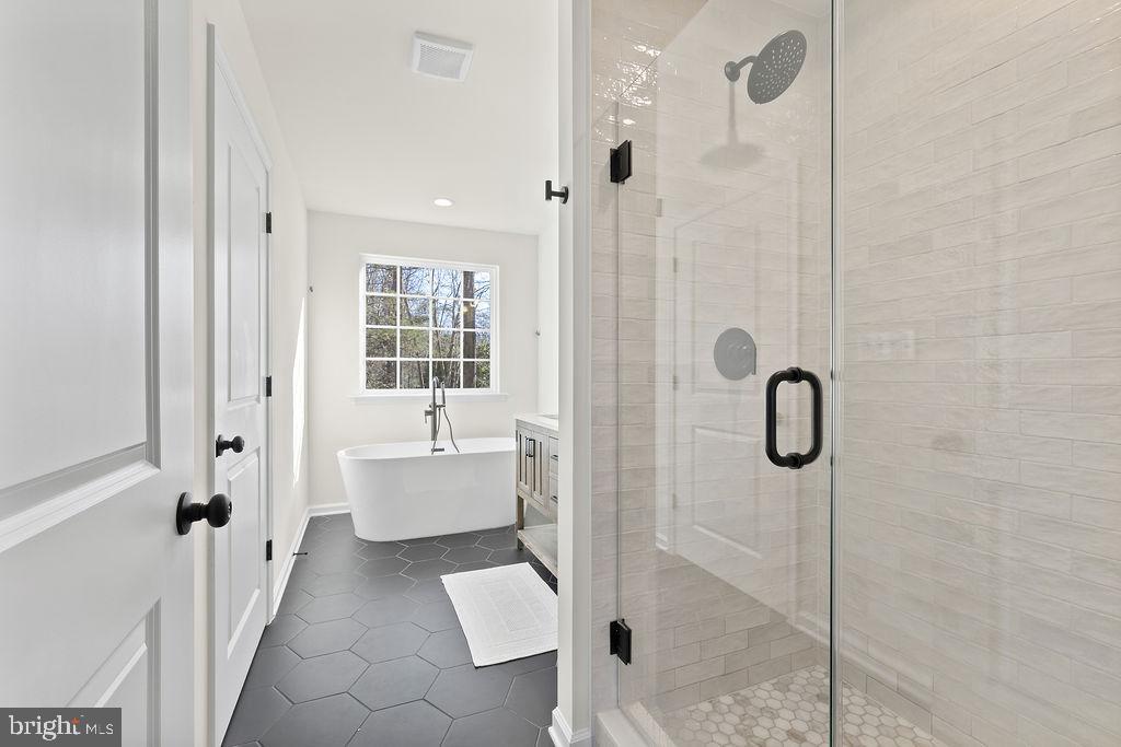 512 Cedar Hill Road Mineral, VA 23117 - Photo 28 of 53 a bathroom with a tub shower