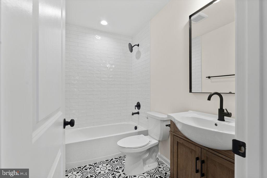 512 Cedar Hill Road Mineral, VA 23117 - Photo 34 of 53 a bathroom with a sink a toilet and shower