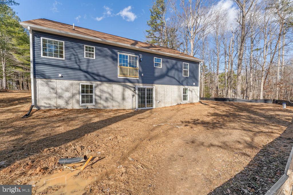 512 Cedar Hill Road Mineral, VA 23117 - Photo 53 of 53 a front view of a house with a road