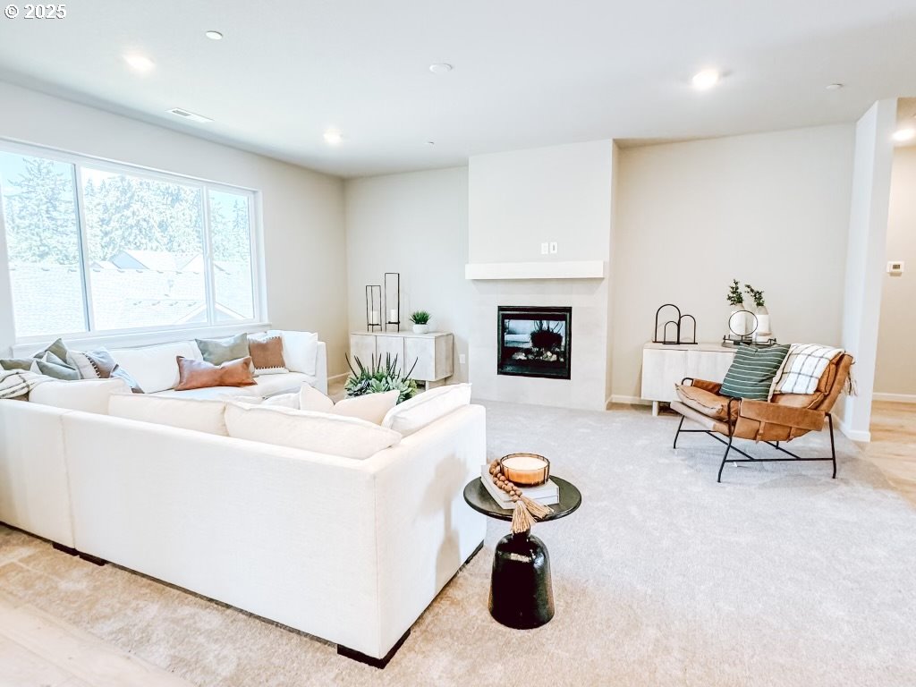 2630 South 4th Way Ridgefield, WA 98642 - Photo 18 of 32 a living room with furniture and a fireplace