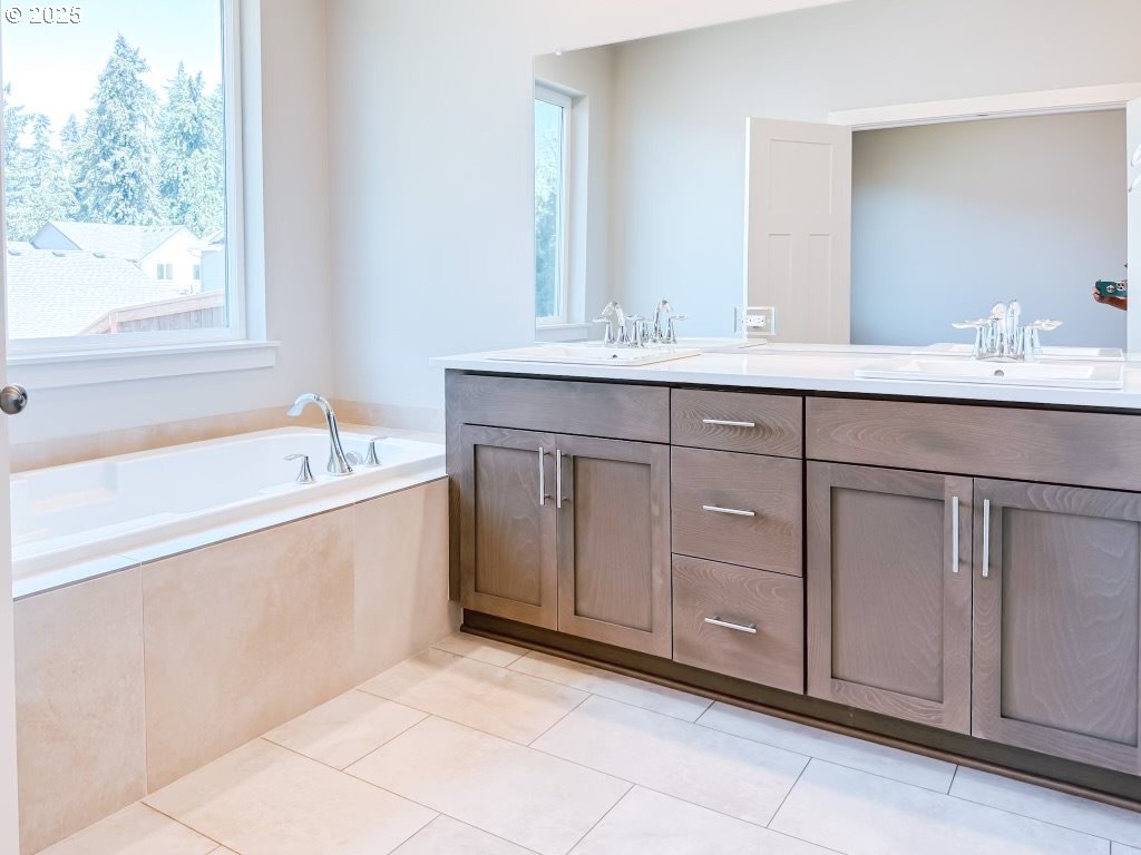 2630 South 4th Way Ridgefield, WA 98642 - Photo 20 of 32 a bathroom with a sink and a bathtub