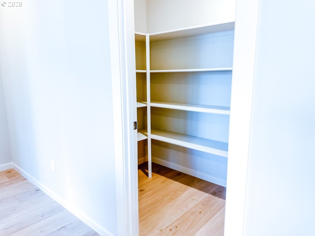 2630 South 4th Way Ridgefield, WA 98642 - Photo 23 of 32 a view of a room with wooden floor