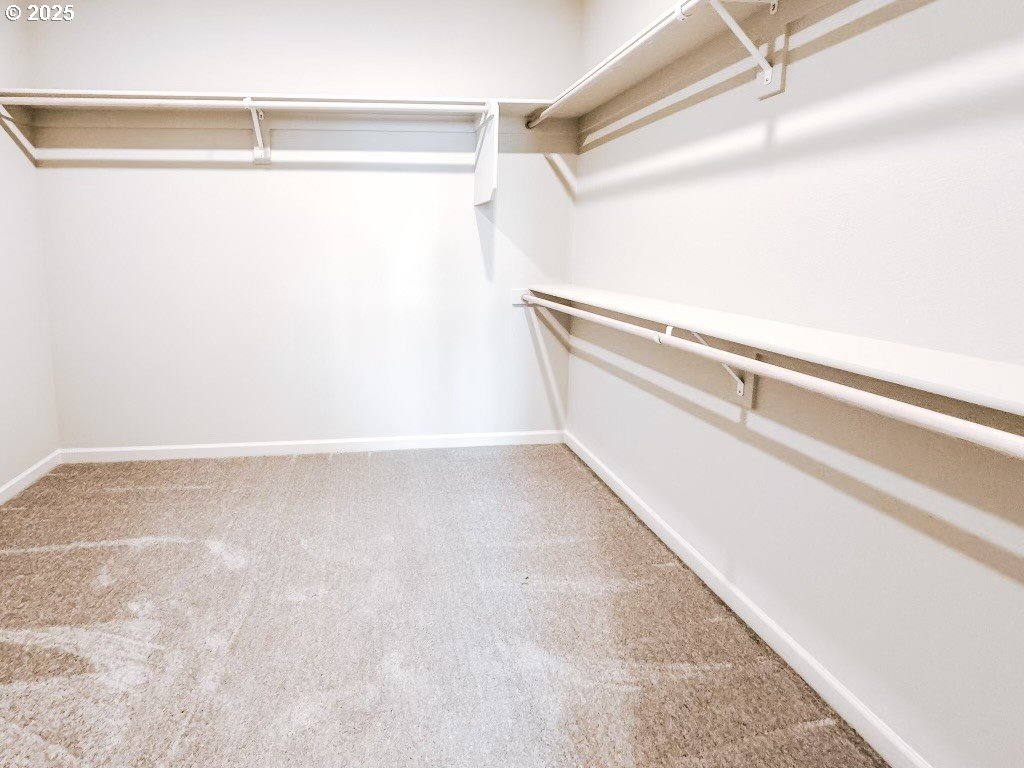 2630 South 4th Way Ridgefield, WA 98642 - Photo 29 of 32 a view of a room with racks on the wall