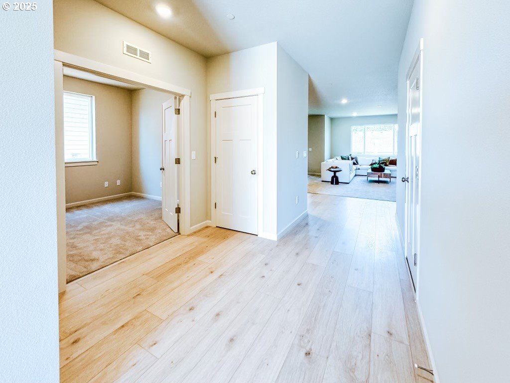 2630 South 4th Way Ridgefield, WA 98642 - Photo 5 of 32 a view of a livingroom with wooden floor