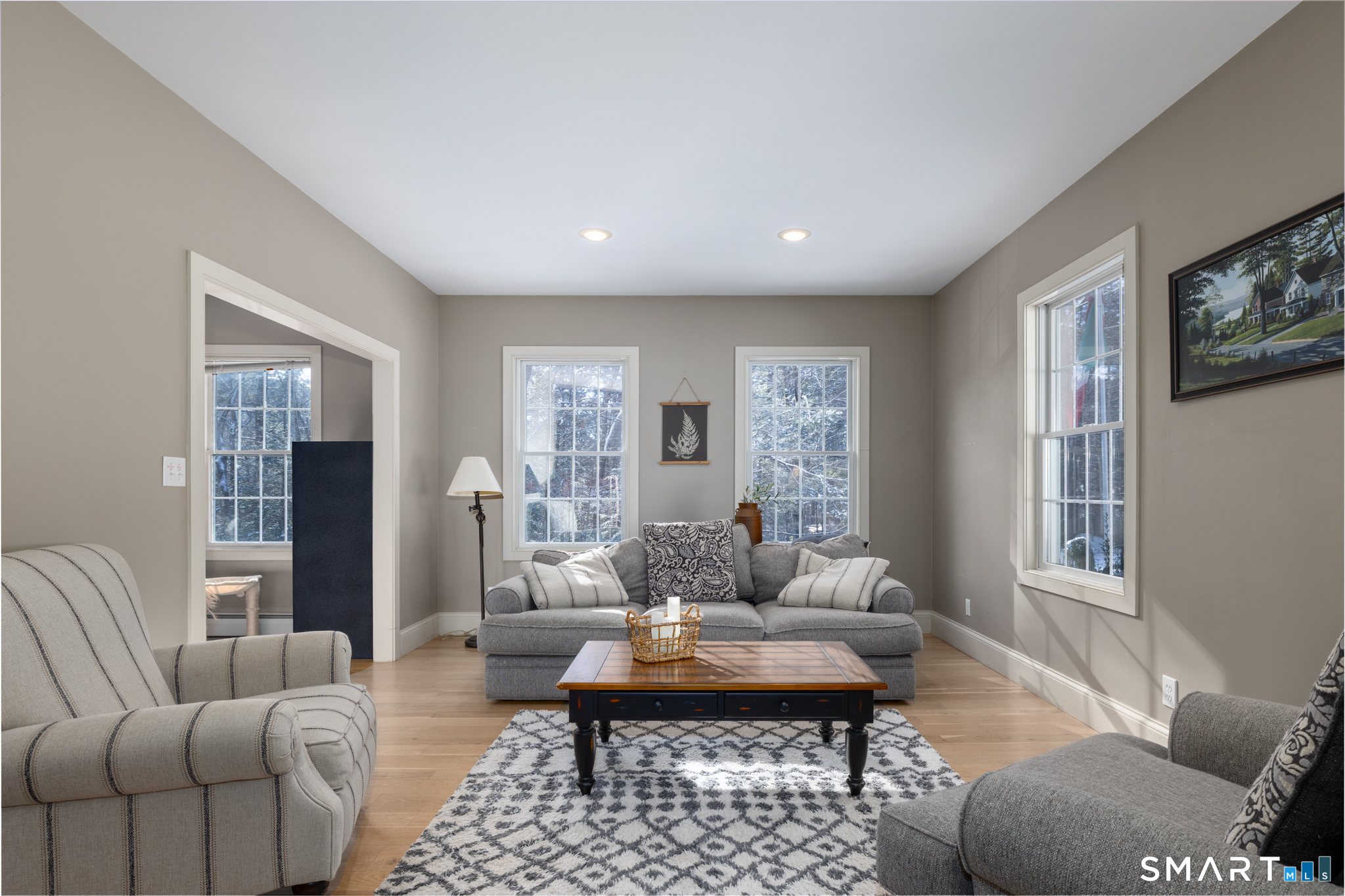 40 Warner Road Barkhamsted, CT 06063 - Photo 12 of 35 a living room with furniture a rug and a large window