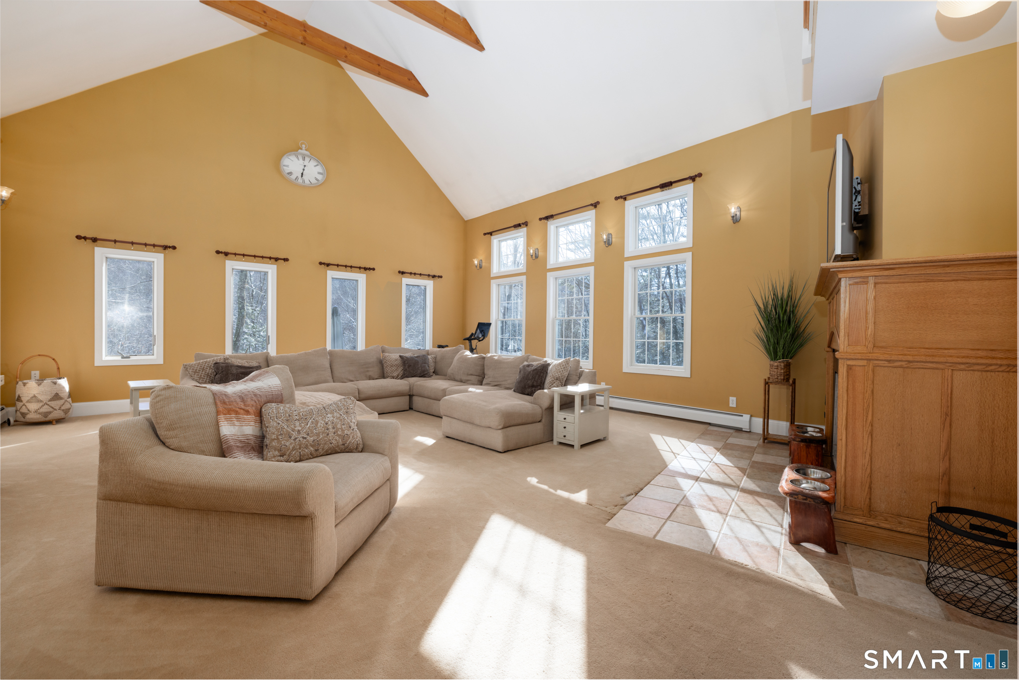 40 Warner Road Barkhamsted, CT 06063 - Photo 16 of 35 a living room with furniture a large window and flat screen tv