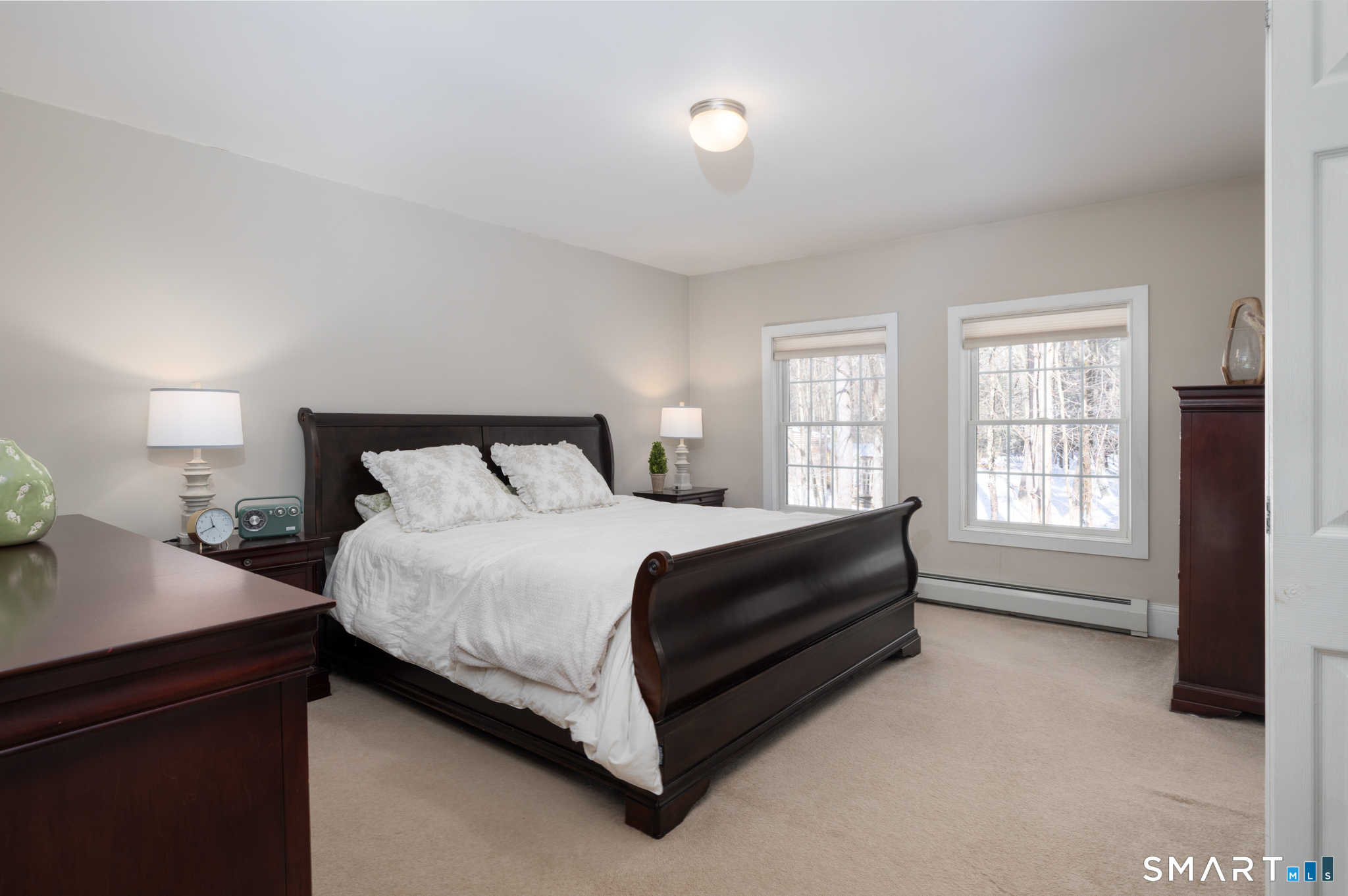 40 Warner Road Barkhamsted, CT 06063 - Photo 22 of 35 a bedroom with a bed and window