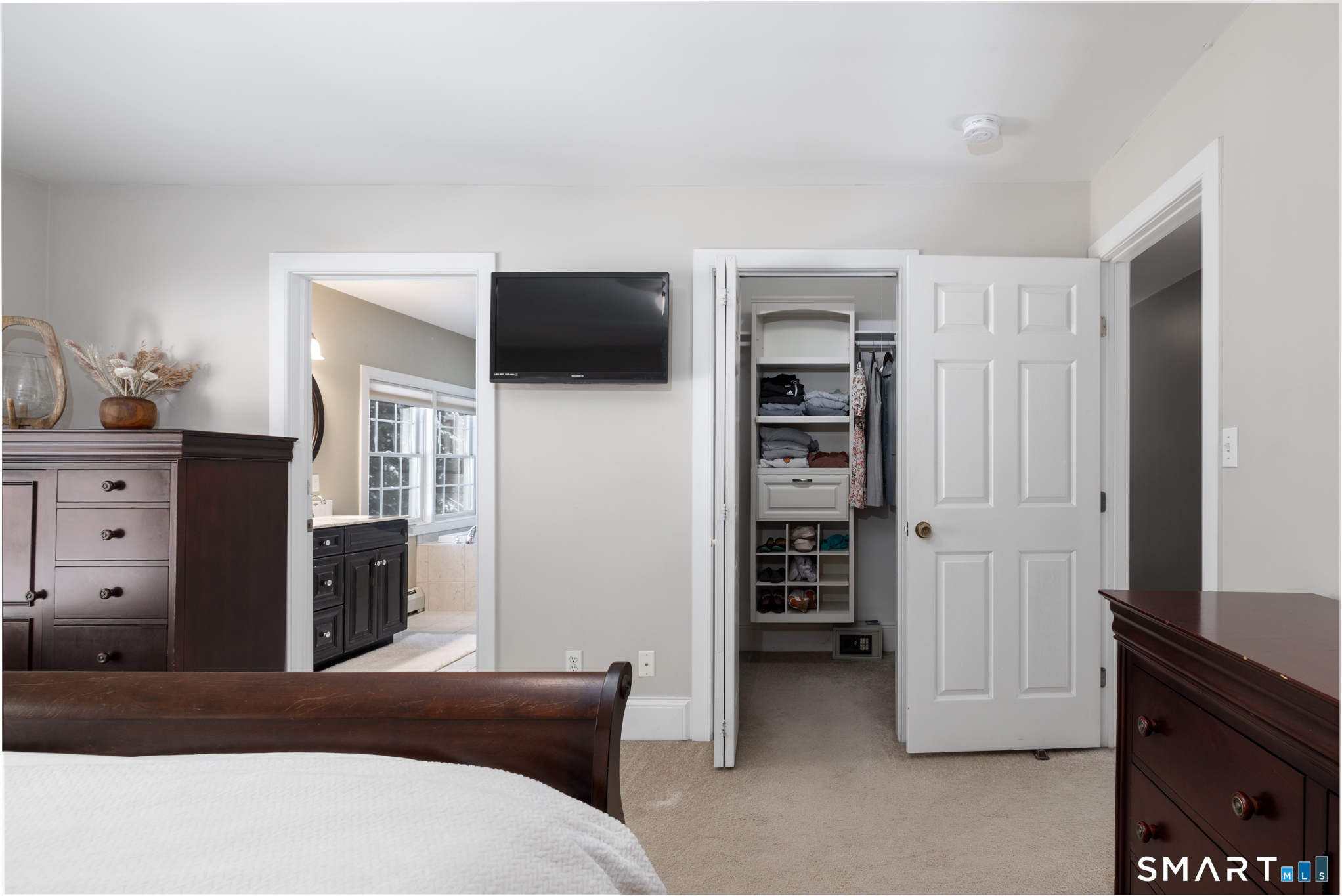 40 Warner Road Barkhamsted, CT 06063 - Photo 23 of 35 a bedroom with a bed and furniture