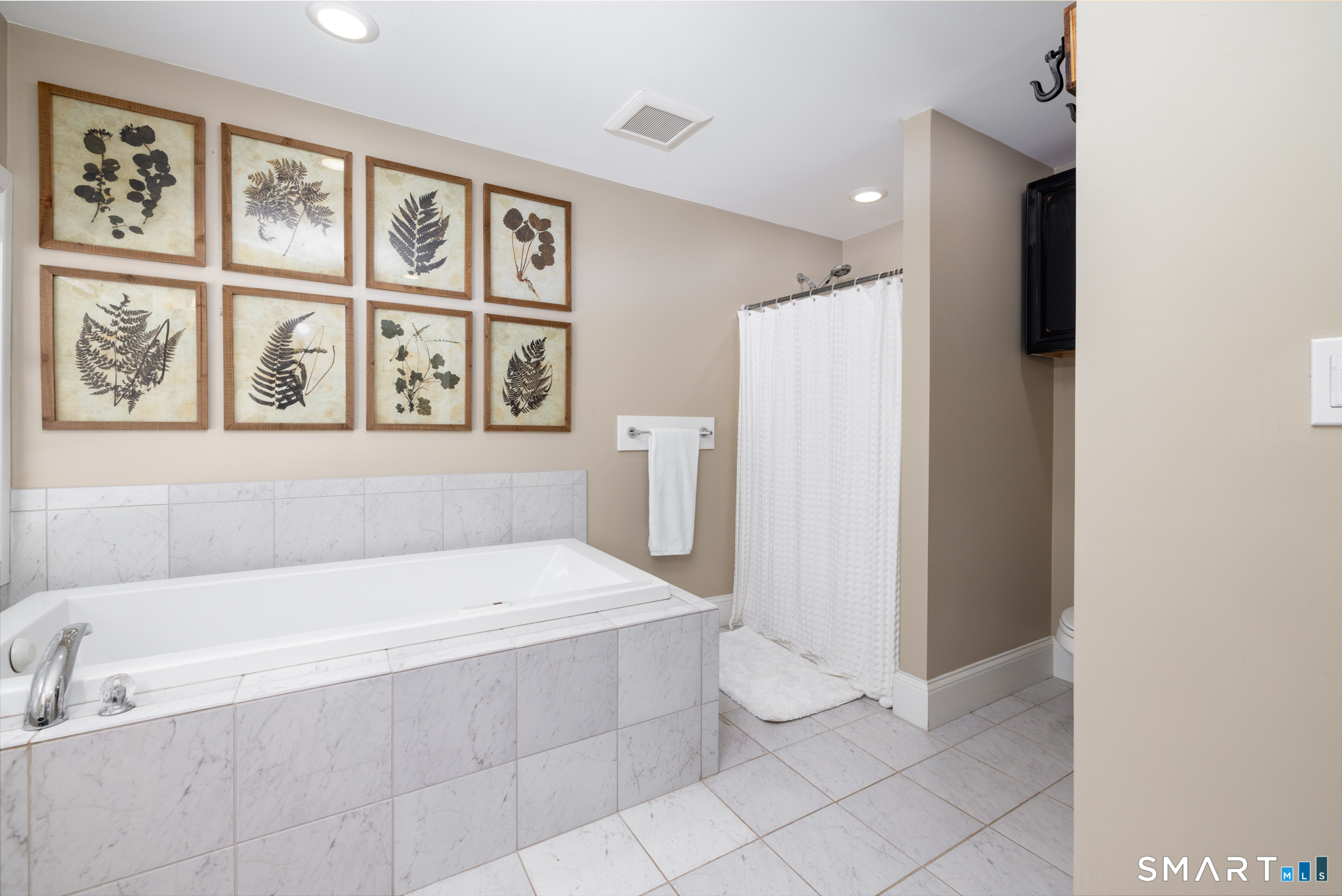 40 Warner Road Barkhamsted, CT 06063 - Photo 25 of 35 a bathroom with a bathtub and a shower