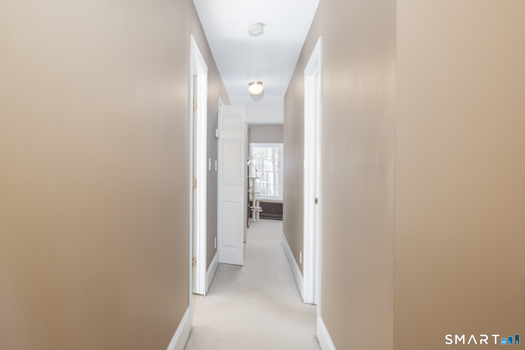 40 Warner Road Barkhamsted, CT 06063 - Photo 30 of 35 a view of a hallway with wooden floor and a bathroom