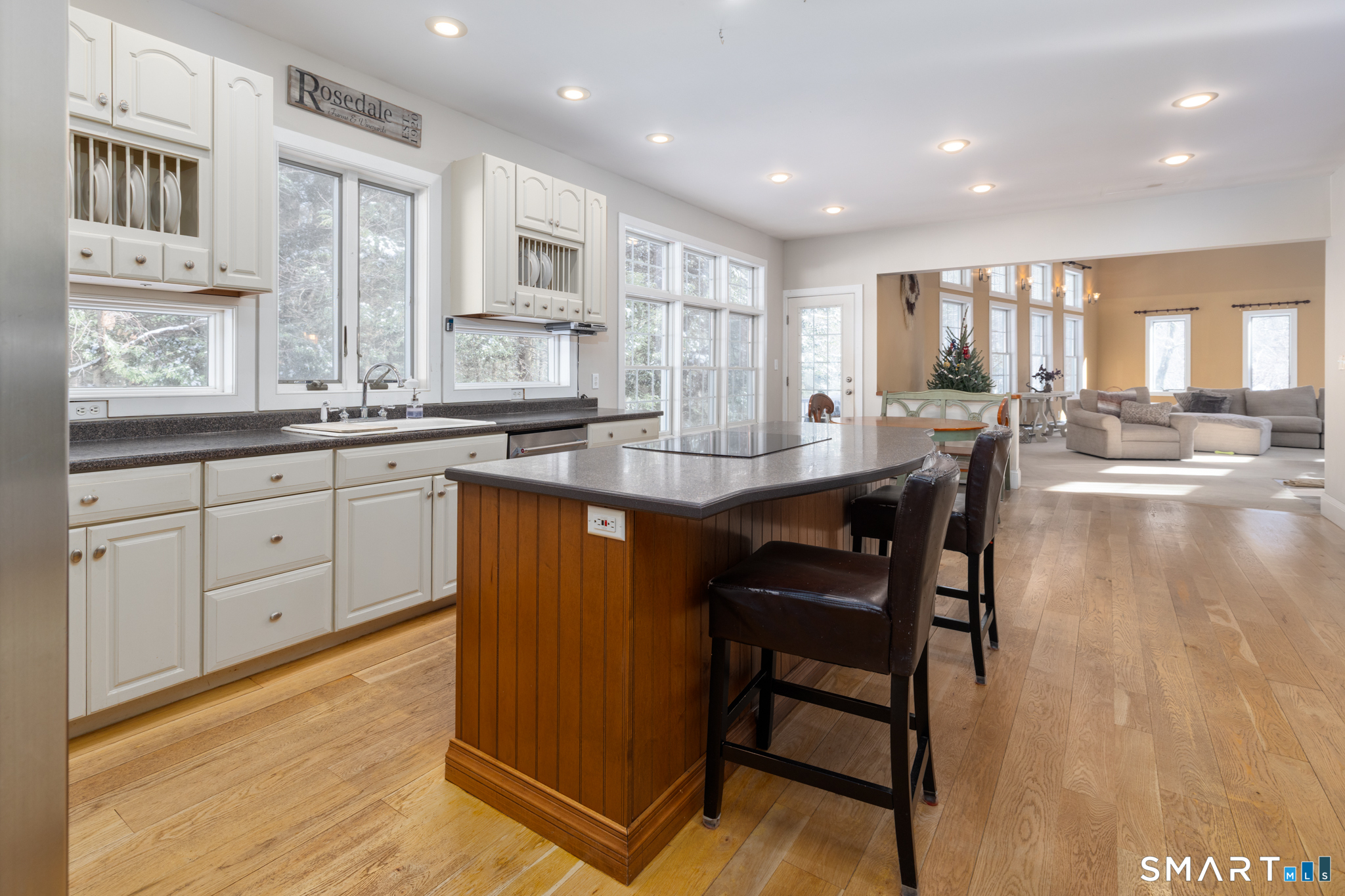 40 Warner Road Barkhamsted, CT 06063 - Photo 9 of 35 a kitchen with granite countertop a sink cabinets and wooden floor