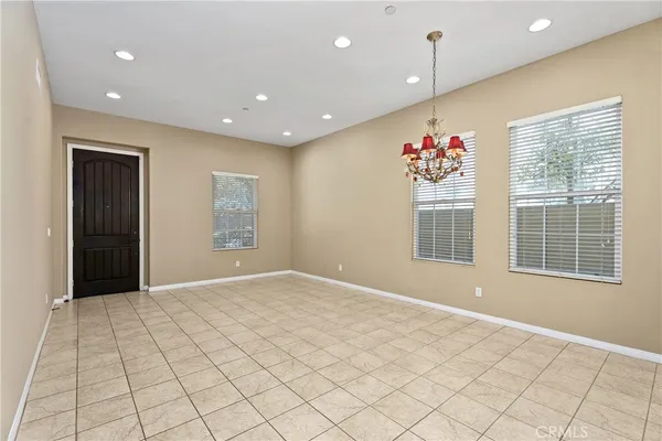 a view of empty room with fireplace