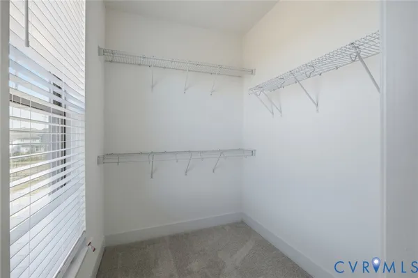 a view of a room with racks on the wall
