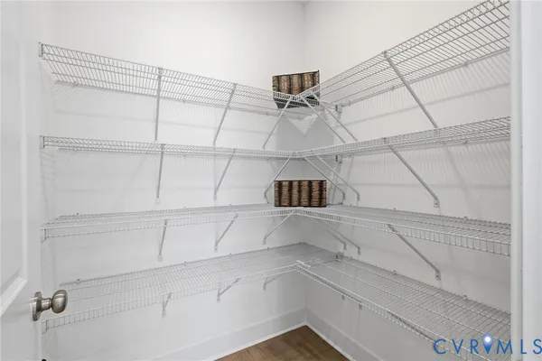 a view of a store room with windows