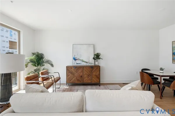 a living room with furniture and a couch