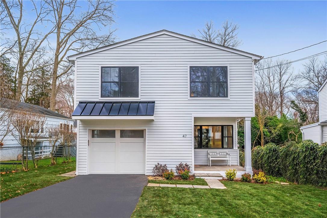 47 Harding Drive Rye, NY 10580 - Photo 1 of 1 a front view of a house with garden