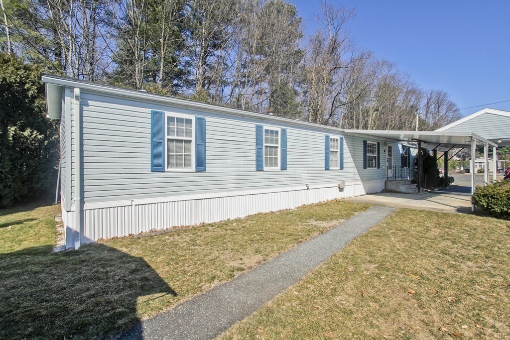 62 Holiday Circle Chicopee, MA 01020 - Photo 15 of 17 a house with trees in the background