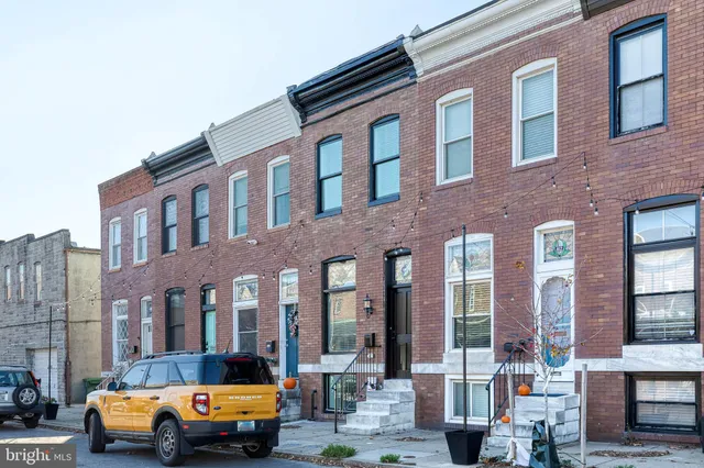 a car parked in front of a building
