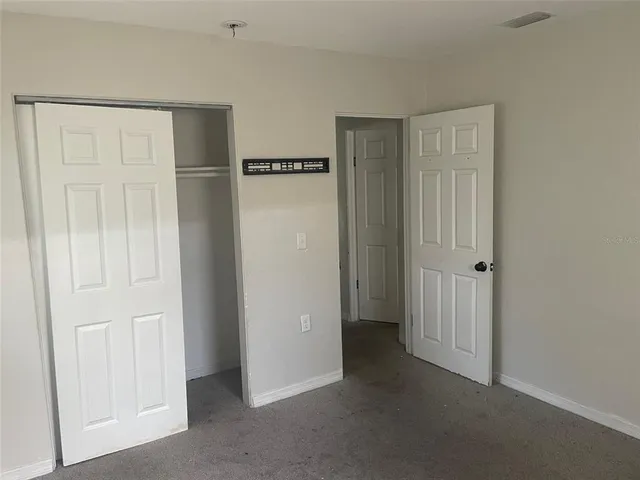a view of a room with an empty space