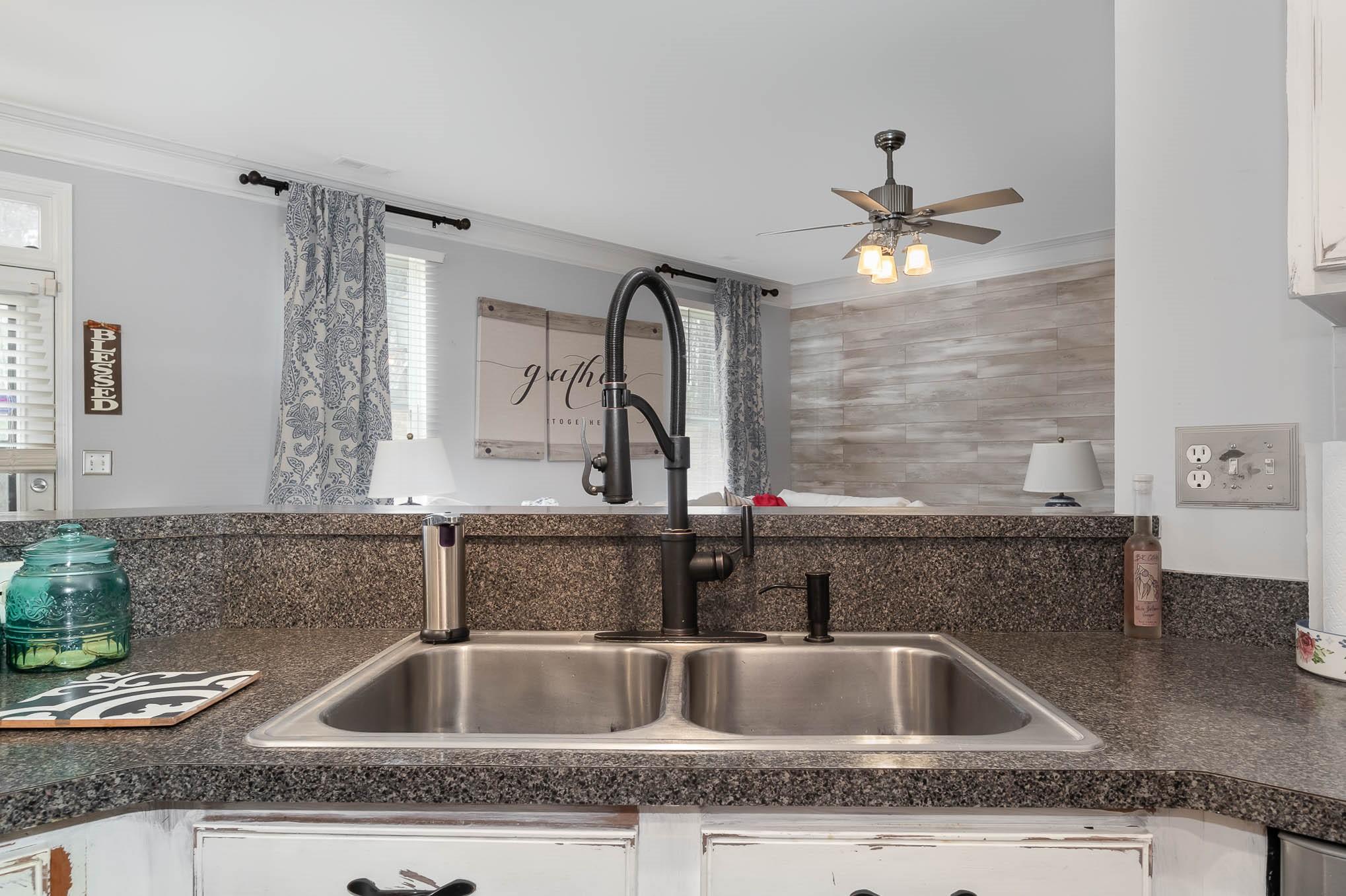 707 Harrier Road Charlotte, NC 28216 - Photo 12 of 29 a kitchen with granite countertop a sink and a granite counter tops