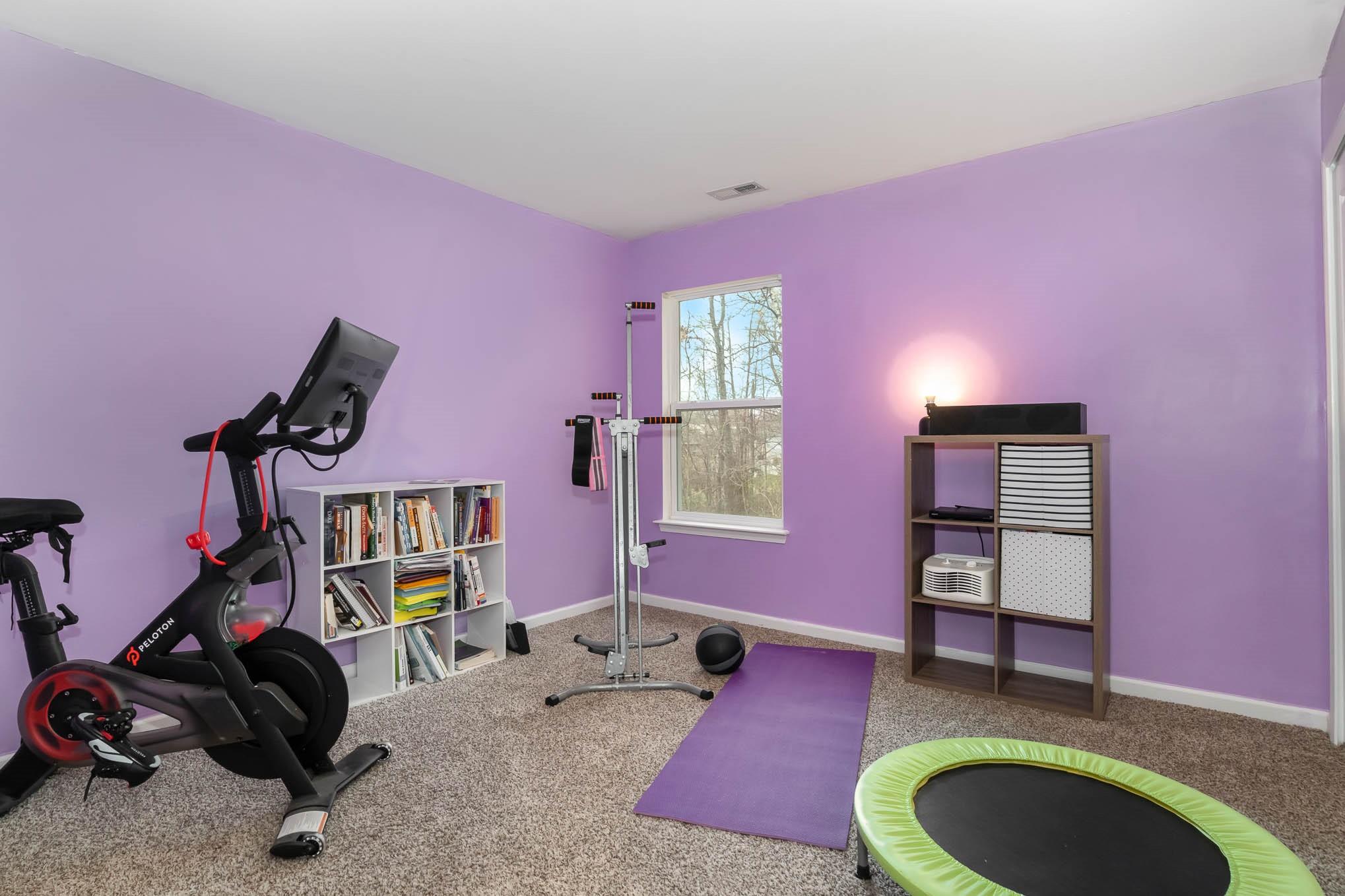 707 Harrier Road Charlotte, NC 28216 - Photo 21 of 29 a living room with furniture and a wooden floor