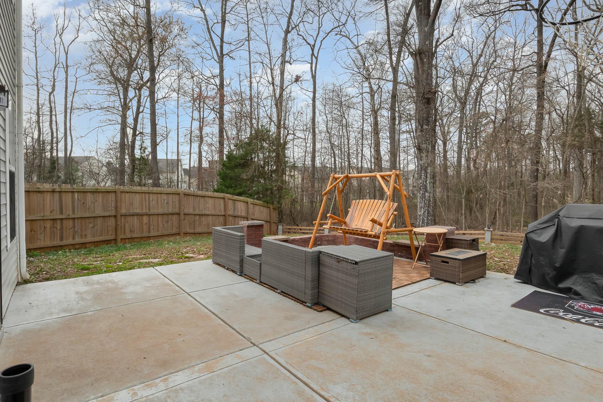 707 Harrier Road Charlotte, NC 28216 - Photo 26 of 29 a view of backyard with sitting area