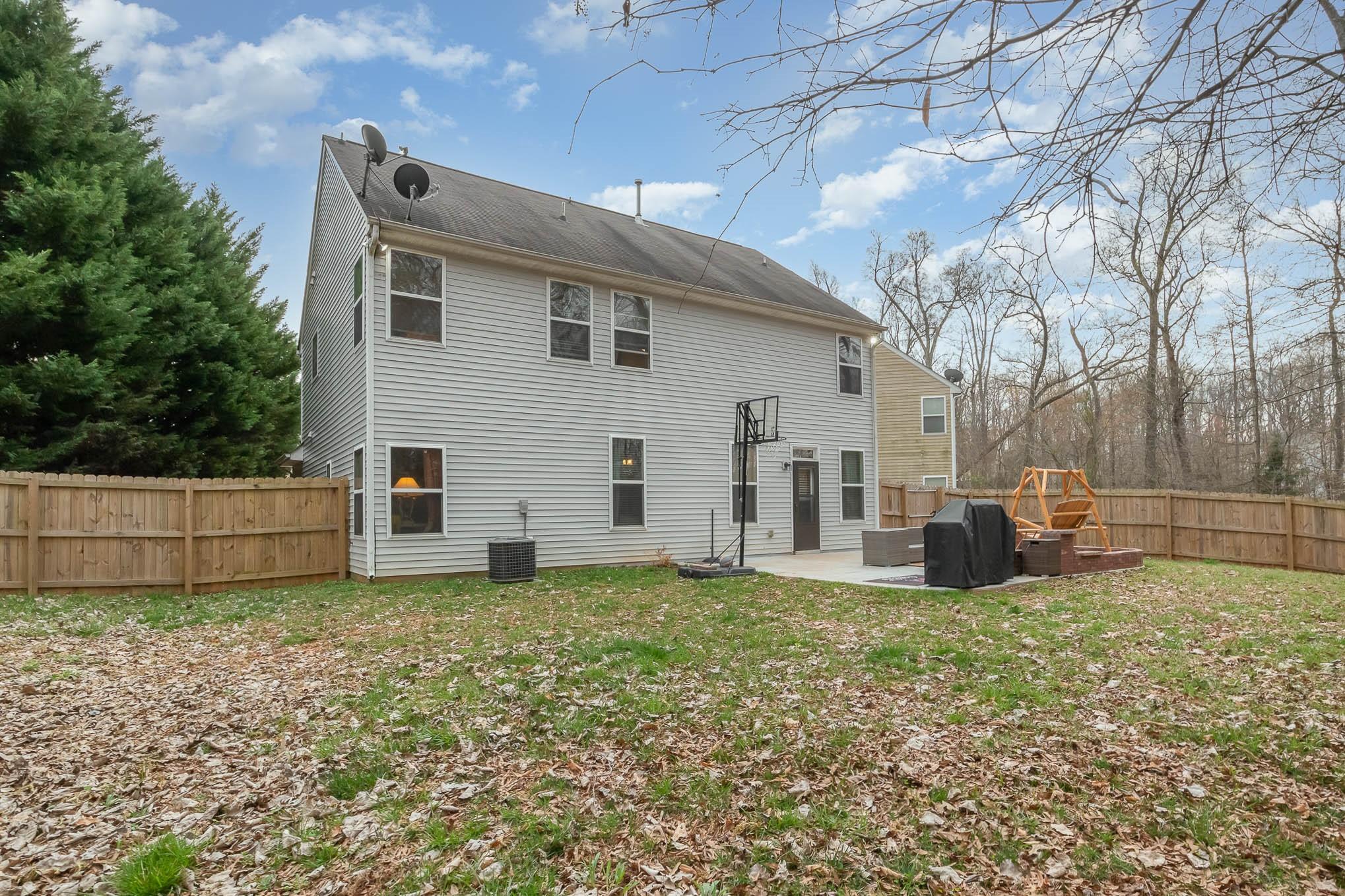 707 Harrier Road Charlotte, NC 28216 - Photo 28 of 29 a view of a house with a yard