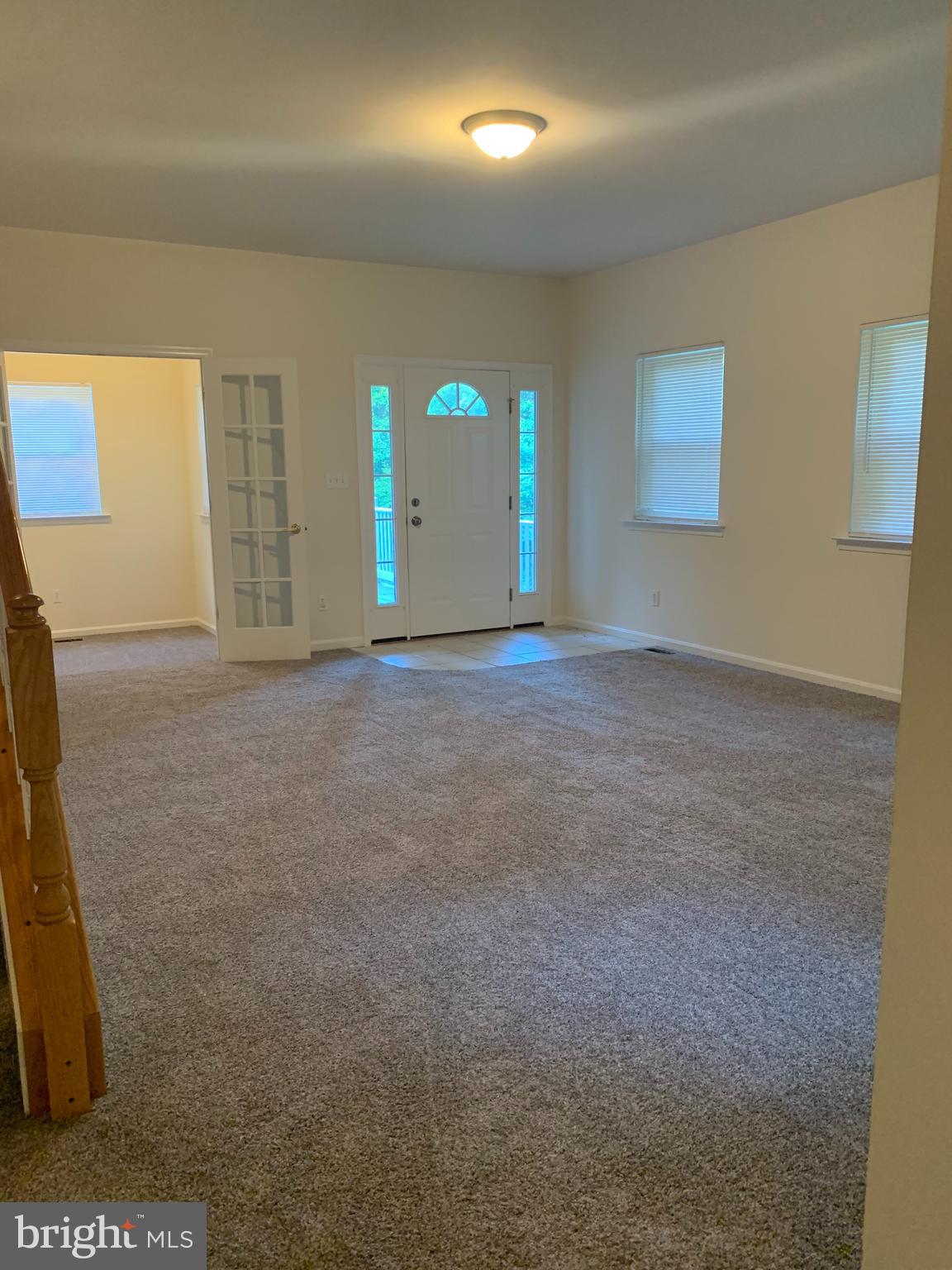 5061 Bayside Road Chesapeake Beach, MD 20732 - Photo 2 of 15 a view of an empty room with a window