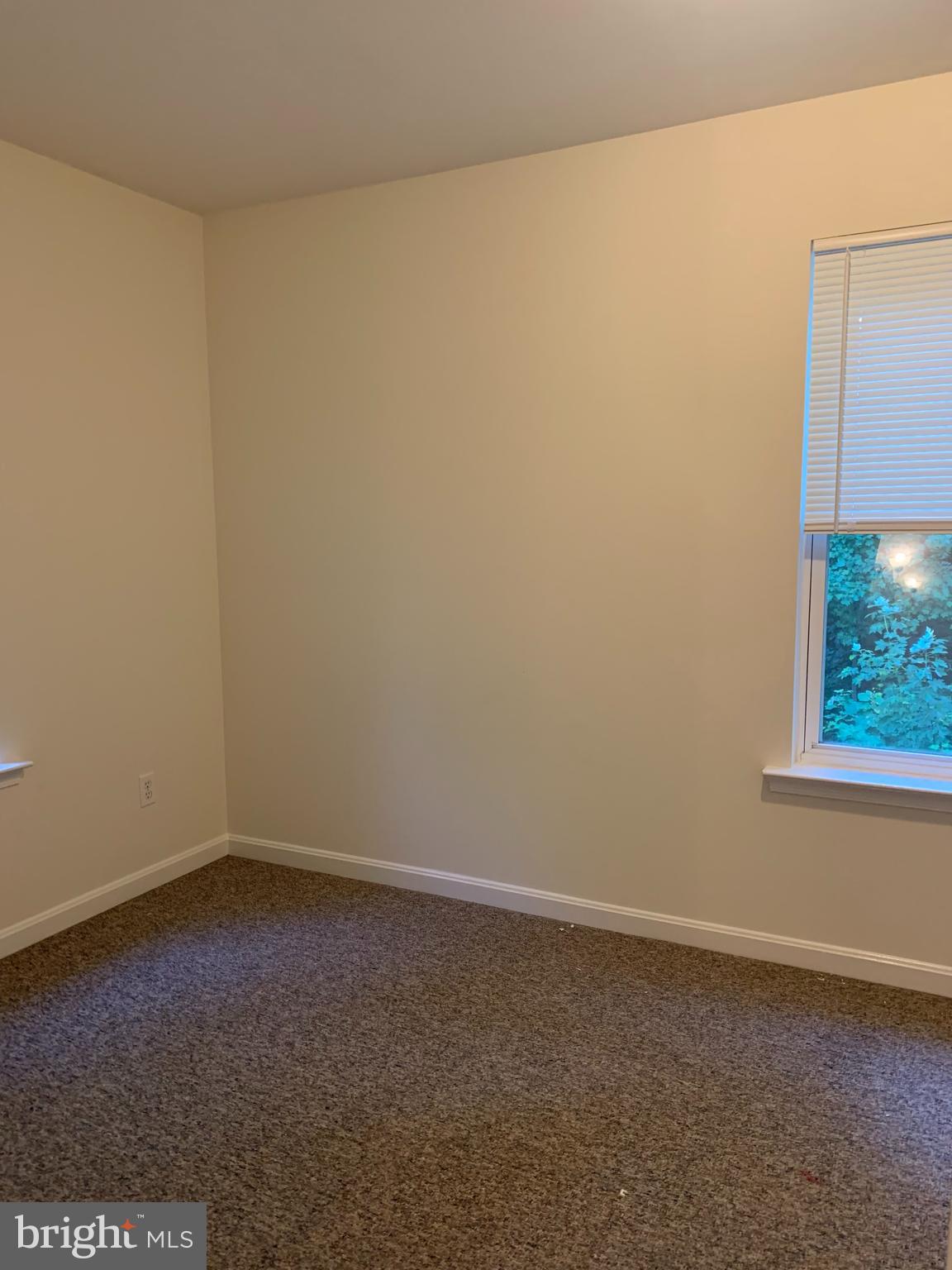 5061 Bayside Road Chesapeake Beach, MD 20732 - Photo 9 of 15 an empty room with a window
