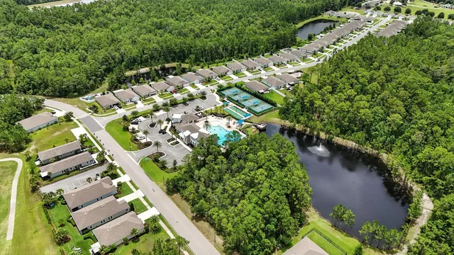 an aerial view of residential house with outdoor space