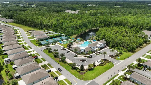 aerial view of a house with a garden