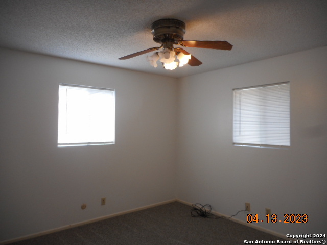 1036 Orts Drive, Unit B Pleasanton, TX 78064 - Photo 5 of 5 an empty room with a window