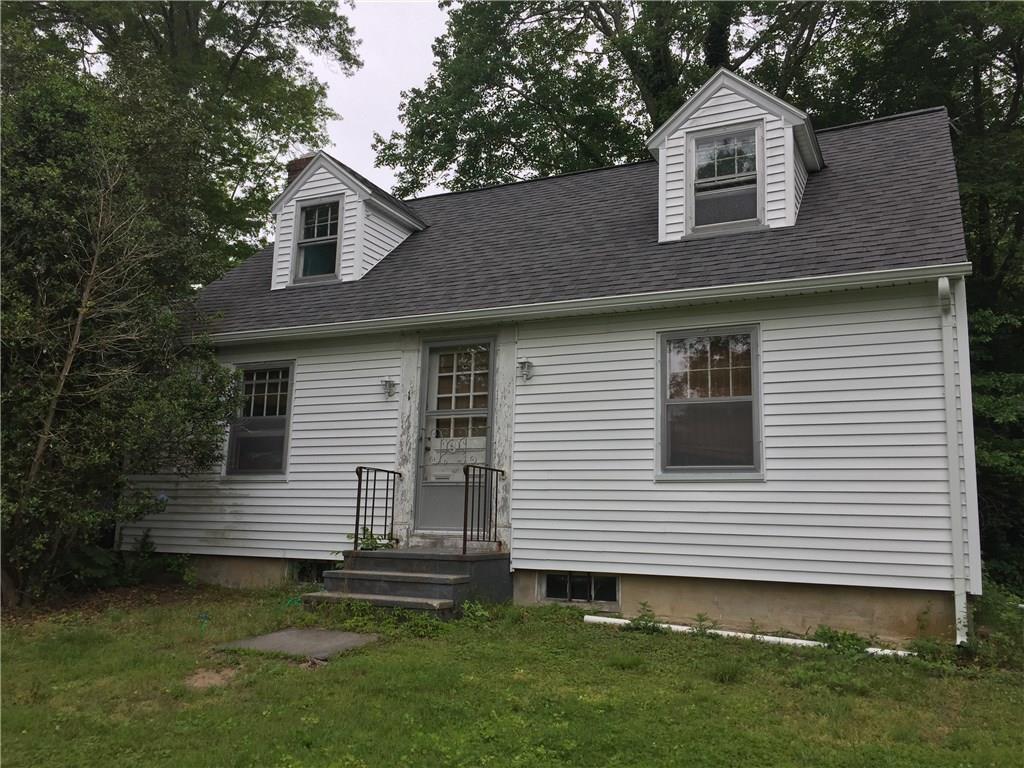 1 Old Black Point Road East Lyme, CT 06357 - Photo 1 of 1 a front view of a house with a garden