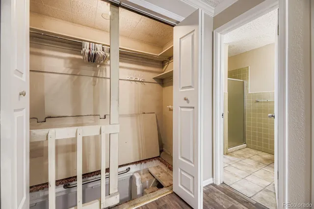 a view of balcony with wooden floor and outdoor seating