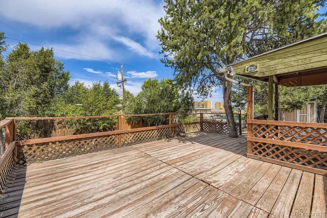 a view of a patio with swimming pool