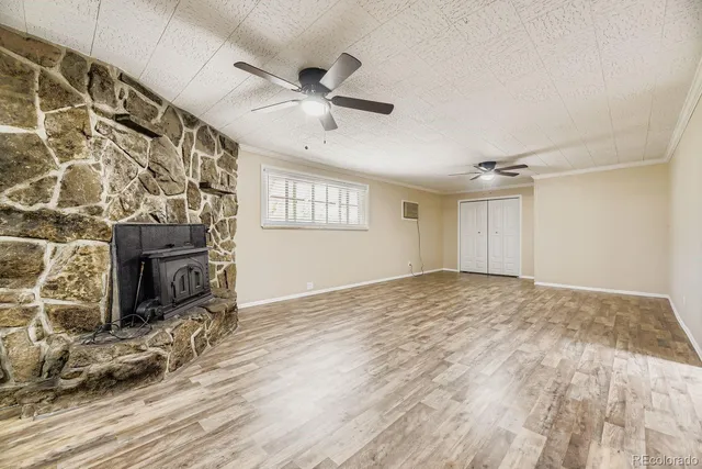 a view of an empty room and a windows