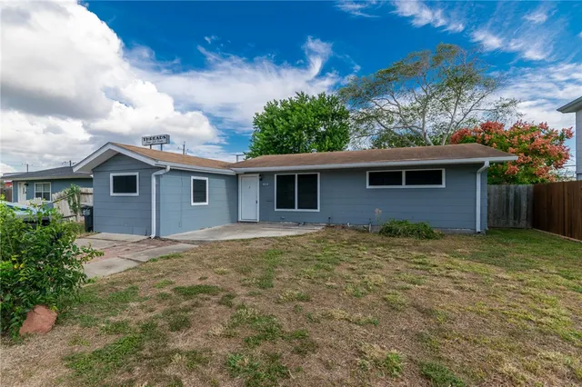 front view of house with a yard