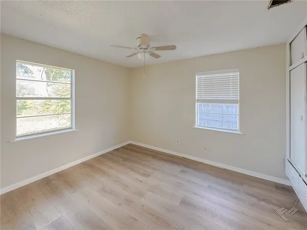 an empty room with windows