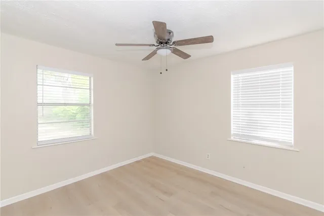 a bathroom with a toilet a sink and bathtub