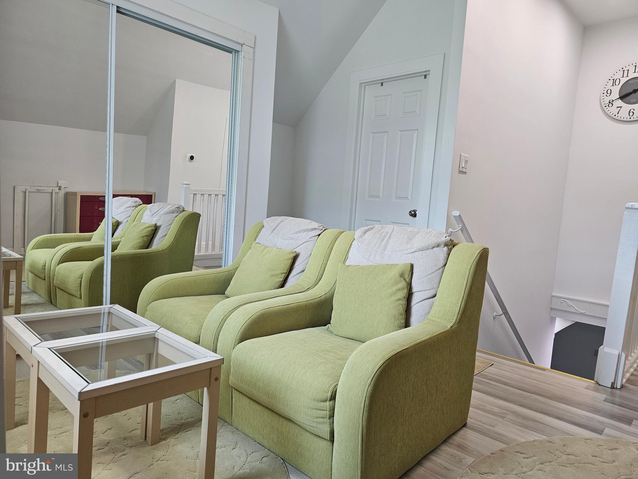 836 New Brooklyn Road Williamstown, NJ 08094 - Photo 40 of 78 a living room with furniture and a wooden floor