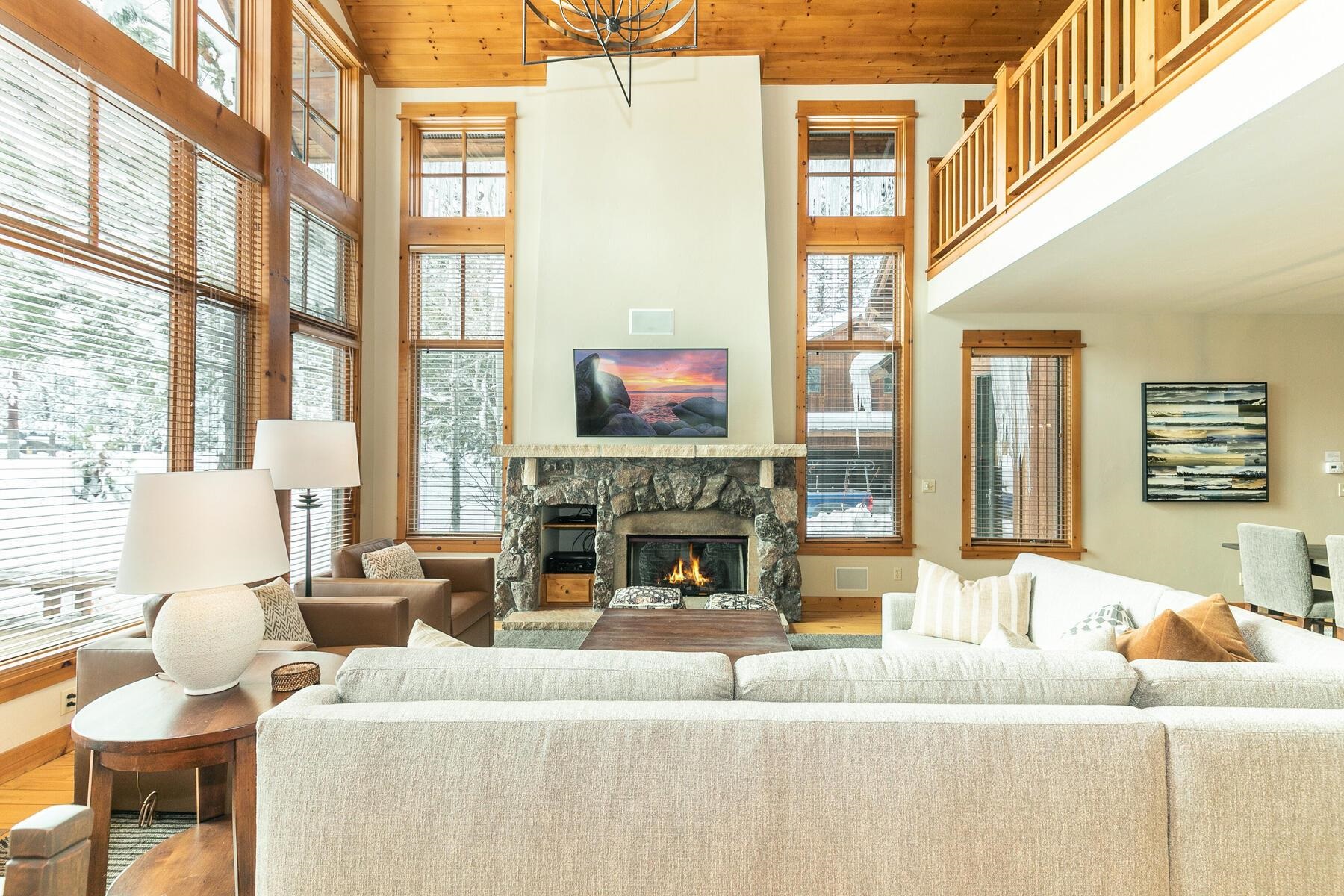 12267 Lookout Loop, Unit F713 Truckee, CA 96161 - Photo 6 of 26 a living room with fireplace furniture and a large window