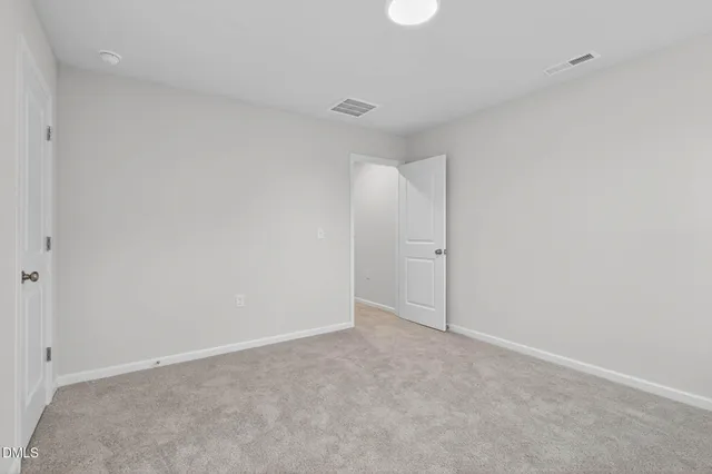 a view of small space with empty racks on the wall