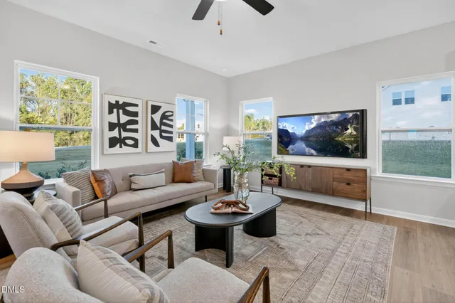 a kitchen with stainless steel appliances a sink stove and cabinets