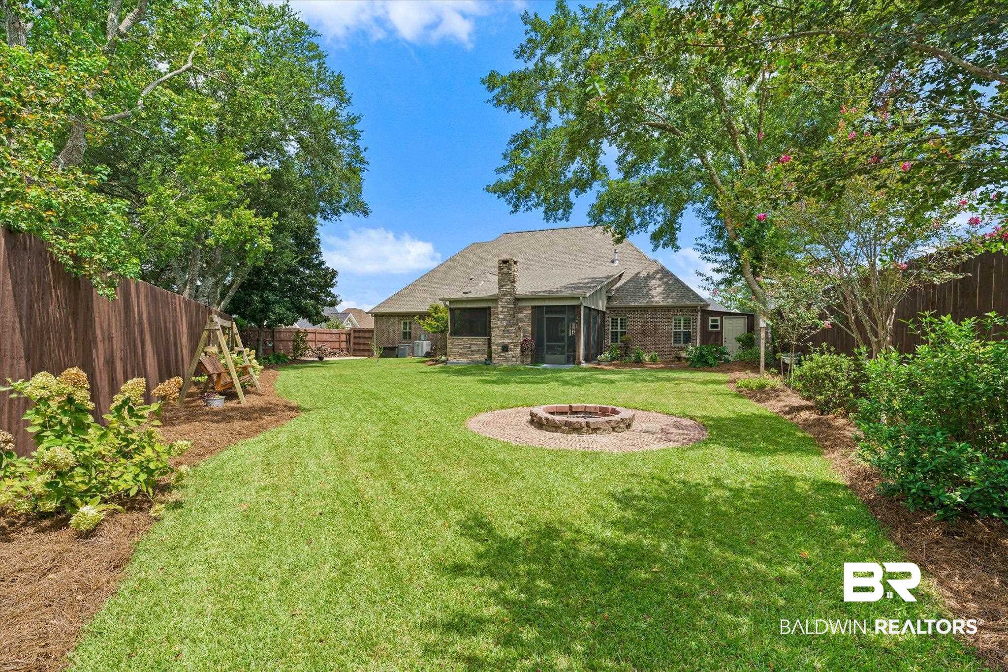 5683 Spring Landing Drive Theodore, AL 36582 - Photo 43 of 49 View of yard featuring a fire pit