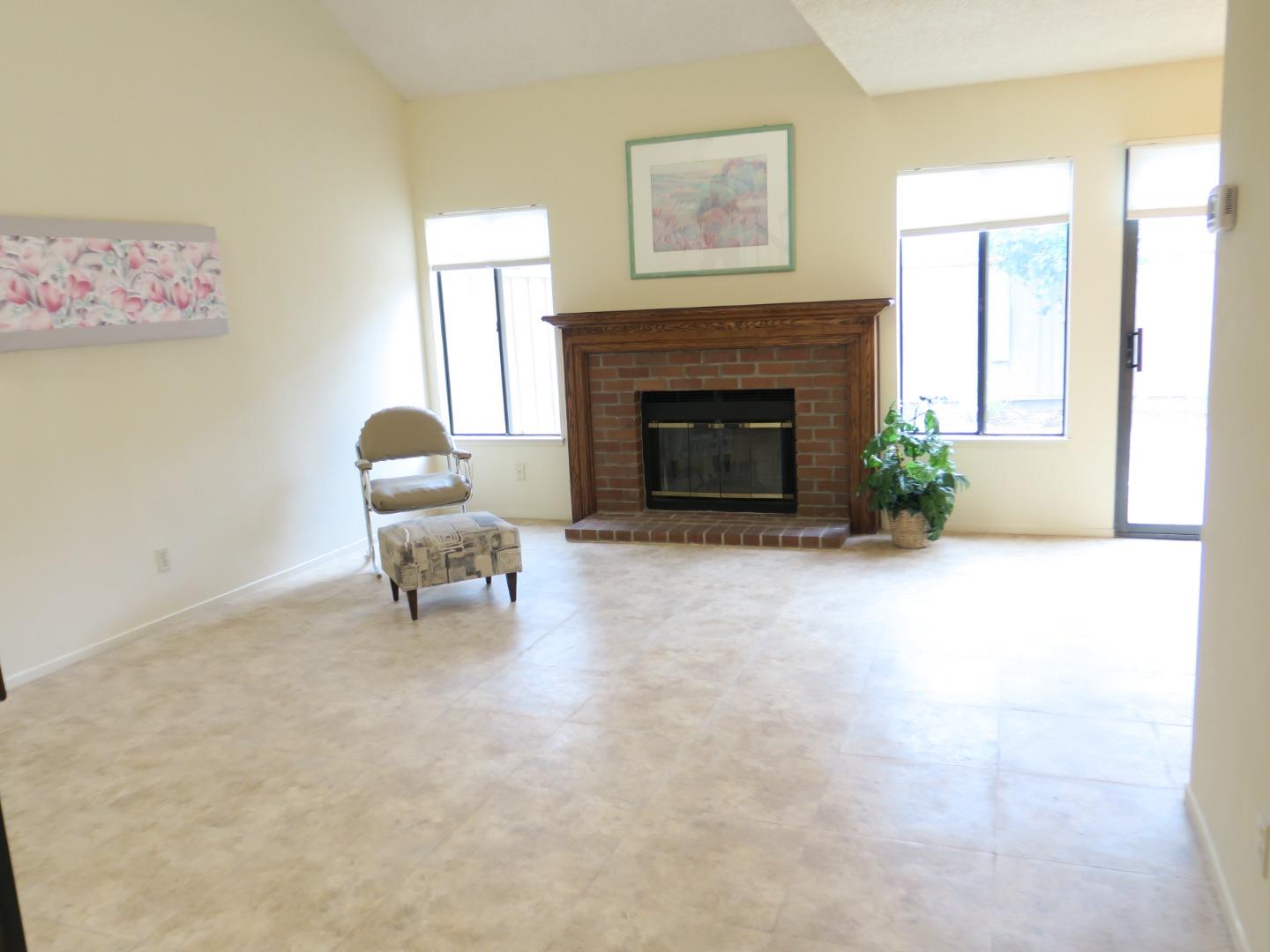 291 Klamath Road Milpitas, CA 95035 - Photo 3 of 20 a living room with furniture and a fireplace