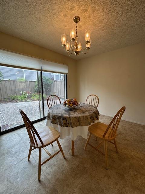 291 Klamath Road Milpitas, CA 95035 - Photo 4 of 20 a view of a dining room with furniture and a chandelier